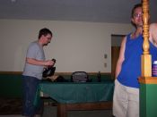 George unpacks his big lens while Tonee watches.