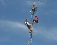 This one is so Ben "no-one-else-is" Harder  (He scales the tower in sandals)