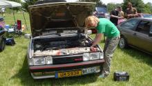 Maryanne works on her radiator fan wiring